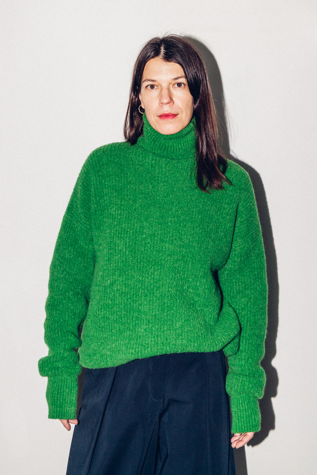 Green alpaca turtleneck sweater