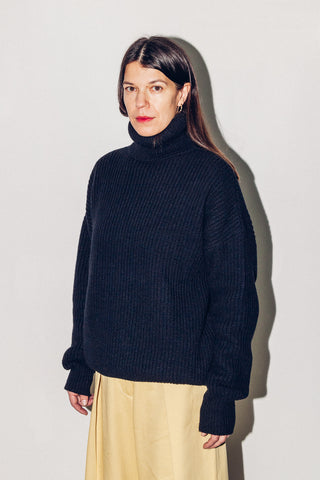 Black merino turtleneck sweater